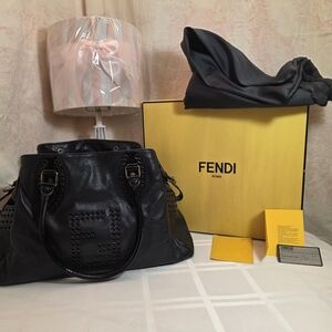 SOLD....Rare Fendi Leather Grommet Handbag Full Inclusion Black
